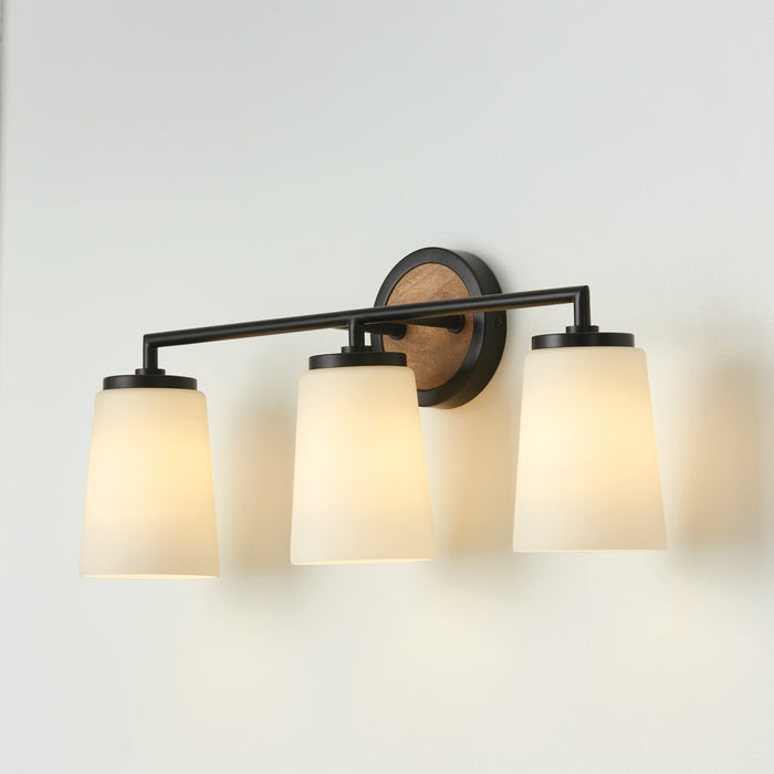 Capital Lighting - 150831WK-546 - Three Light Vanity - Jonah - Light Wood and Matte Black